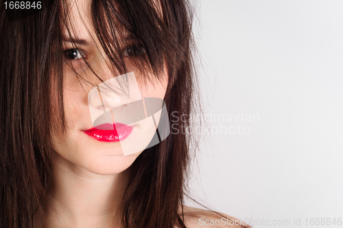 Image of Closeup photo of a woman with red lips