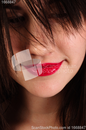 Image of Closeup photo of a woman with red lips