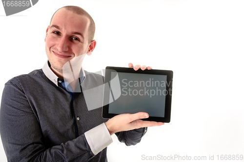 Image of Handsome man with tablet