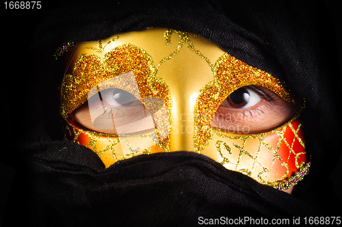 Image of Girl in carnival mask