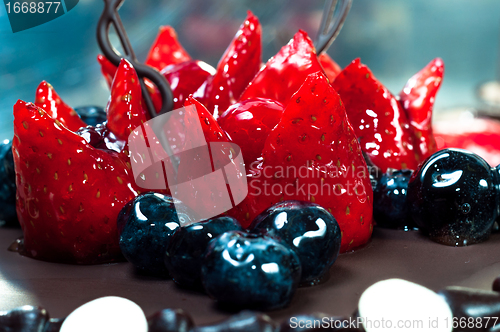 Image of Delicious fruits on cake