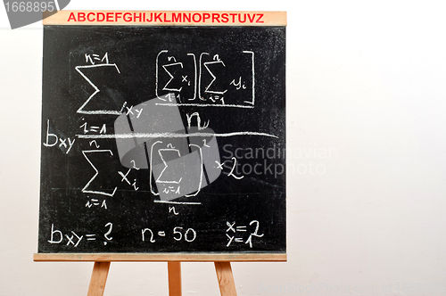 Image of Black chalkboard with formula