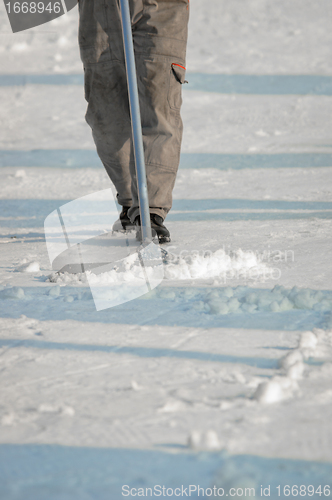 Image of Worker cleaning the streets