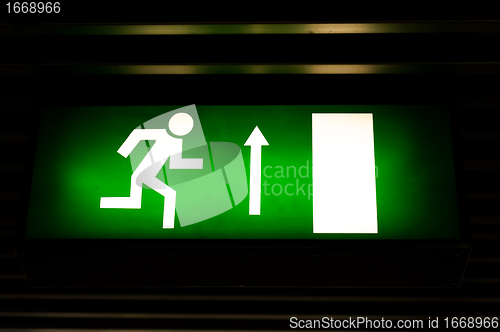 Image of Closeup photo of an exit sign in the metro