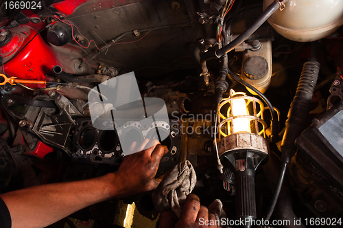 Image of Opened car closeup in garage