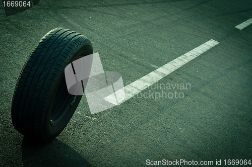 Image of Car tire on the road