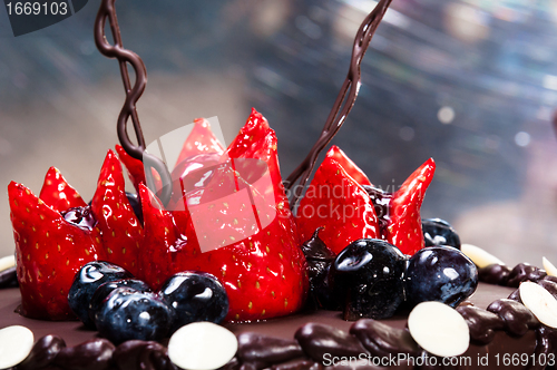 Image of Delicious fruits on cake