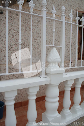 Image of Fence in white with lovely pattern