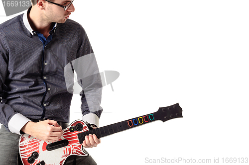 Image of Young guitar artist