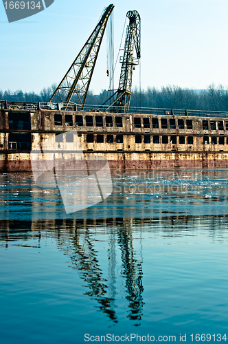 Image of Damaged industrial boat in the dock