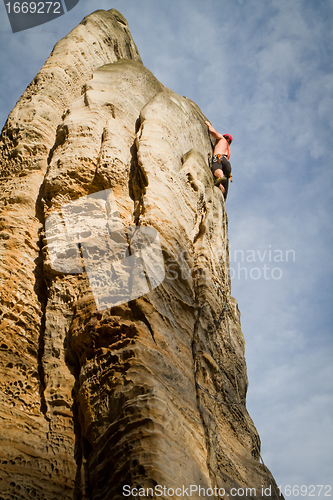 Image of male rock climber