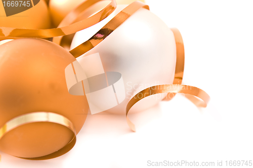 Image of christmas glass balls decorated with ribbons