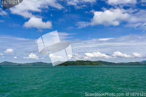 Image of Landscape of palm island on the horizon in the Andaman Sea