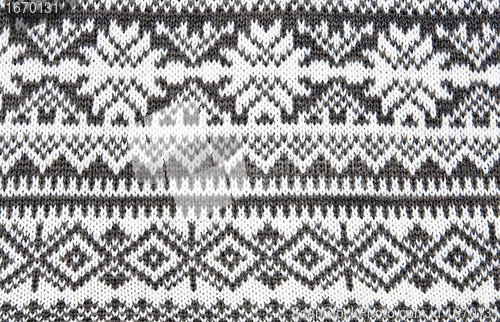 Image of gray background with a knitted pattern