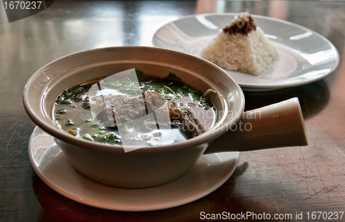 Image of bowl of soup with meat