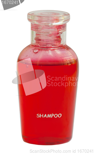 Image of Small red bottle of shampoo