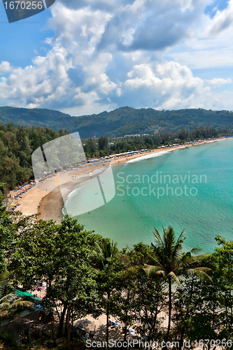 Image of Tropical beach, in a cozy cove surrounded by hills