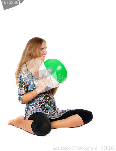 Image of Pregnant girl in an inflatable ball color