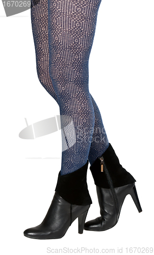 Image of shapely female legs in pantyhose and shoes