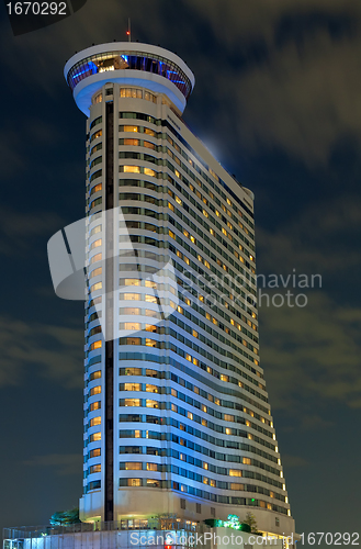 Image of Tall building a fancy kind of night