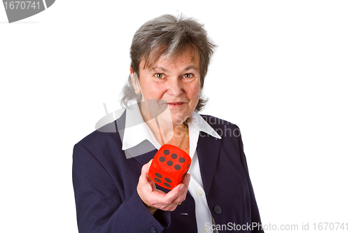 Image of Female senior showing dice
