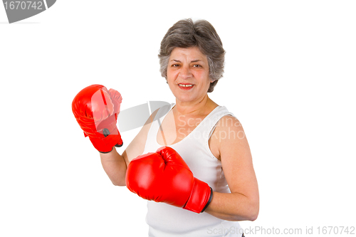 Image of Female senior with boxing gloves
