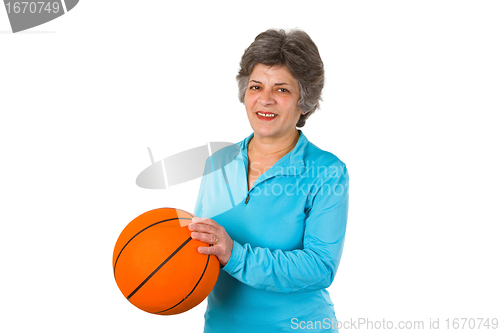Image of Female senior holding basketball 