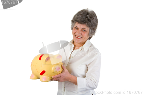 Image of Female senior with piggy bank