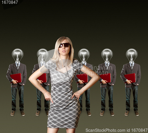 Image of woman and lamp head businesspeople with laptop