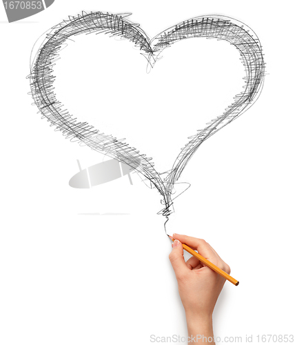 Image of heart and hand with pencil