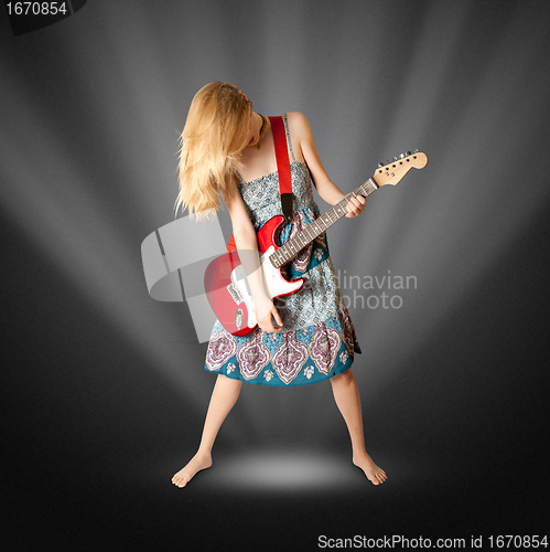 Image of hippie girl with electric guitar
