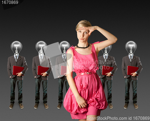 Image of woman and lamp head businesspeople with laptop