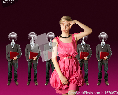 Image of woman and lamp head businesspeople with laptop