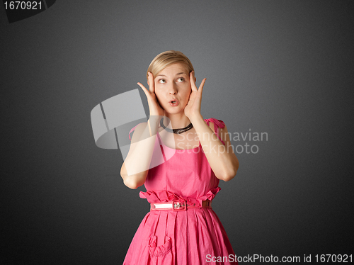 Image of surprised girl in pink