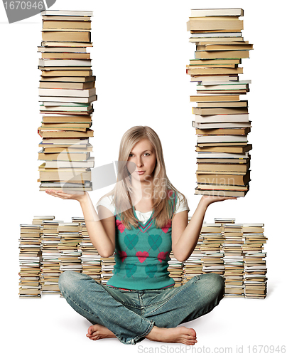 Image of woman in lotus pose with many books in her hands