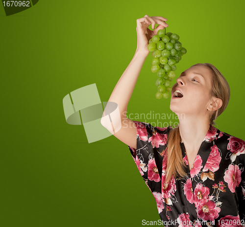 Image of woman with grapes