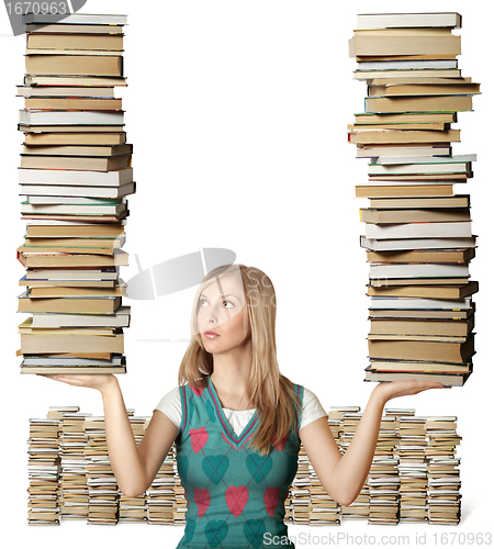 Image of woman with many books in her hands