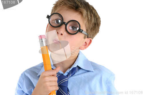 Image of Comical boy holding a pencil and thinking