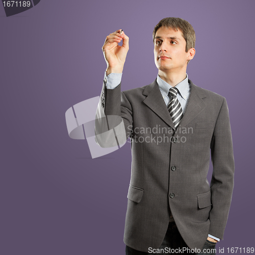 Image of businessman writing something