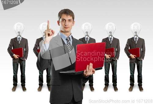 Image of lamp head businesspeople with laptop