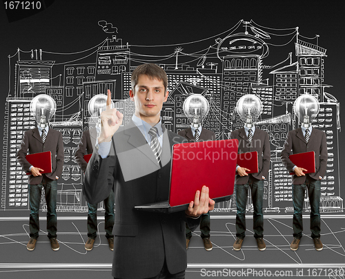 Image of lamp head businesspeople with laptop