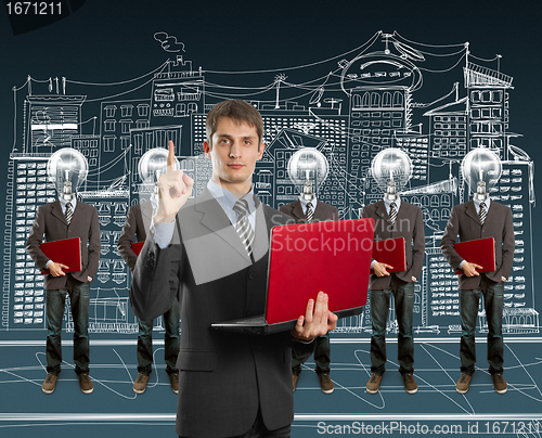 Image of lamp head businesspeople with laptop