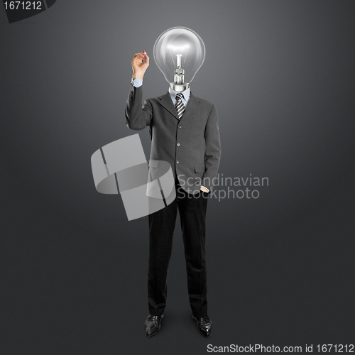 Image of lamp head businessman writing something