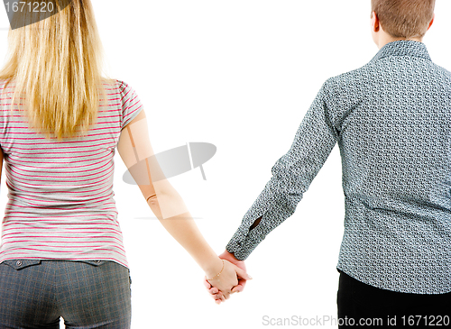 Image of A young couple holding each other's hands