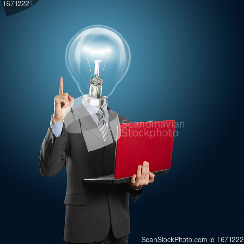 Image of lamp head businessman with laptop