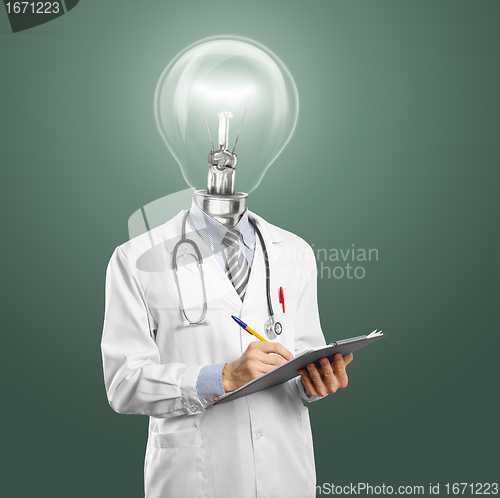 Image of lamphead doctor writing something 