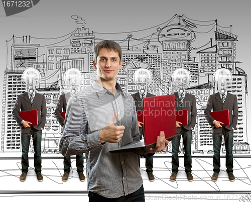 Image of lamp head businesspeople with laptop
