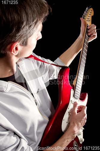 Image of male with guitar