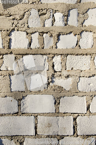 Image of wall made of white brick closeup background. 