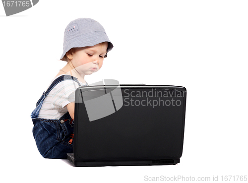 Image of Little boy with a laptop